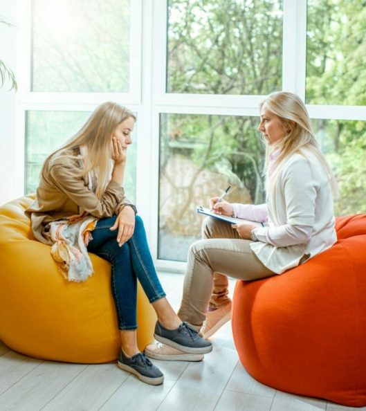 Woman with psychologist in the office